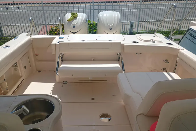 Slide: The Image of 2025 Grady-White Canyon 456 boat interior with seating and amenities. - 14