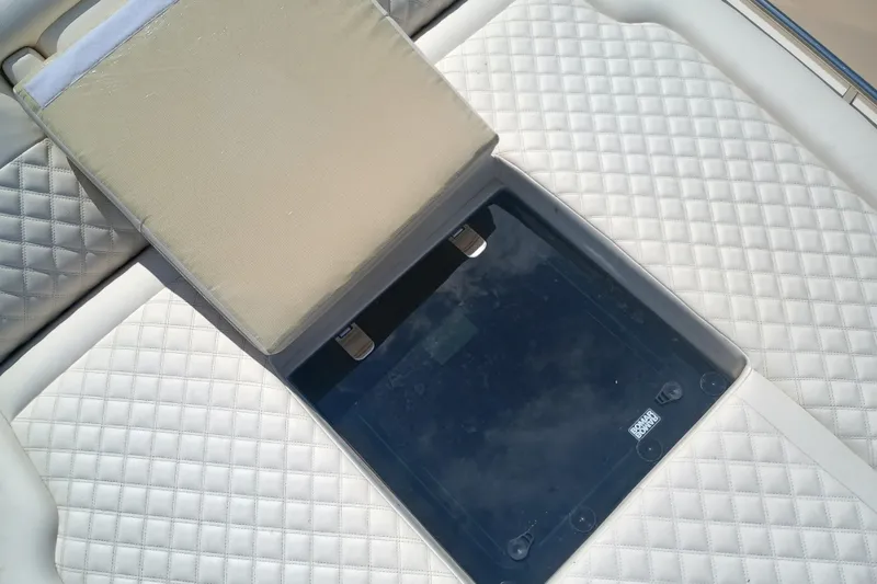 Slide: The Image of Cushioned seating with storage on 2025 Grady-White Canyon 456 boat. - 23