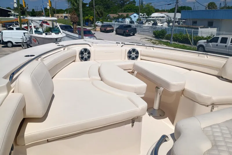 Slide: The Image of Luxurious seating area on a 2025 Grady-White Canyon 456 boat. - 24