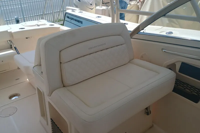 Slide: The Image of 2025 Grady-White Canyon 456 boat interior with luxurious seating. - 4