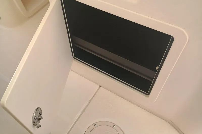 Slide: The Image of 2025 Grady-White Canyon 456 boat interior compartment detail. - 6