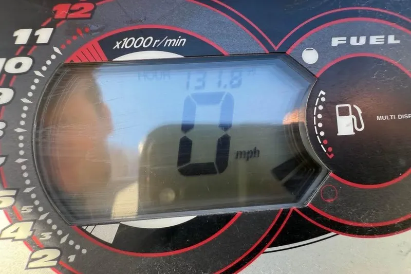 Slide: The Image of Close-up of 2005 Yamaha WaveRunner FX Cruiser HO dashboard display showing 0 mph and fuel gauge. - 4
