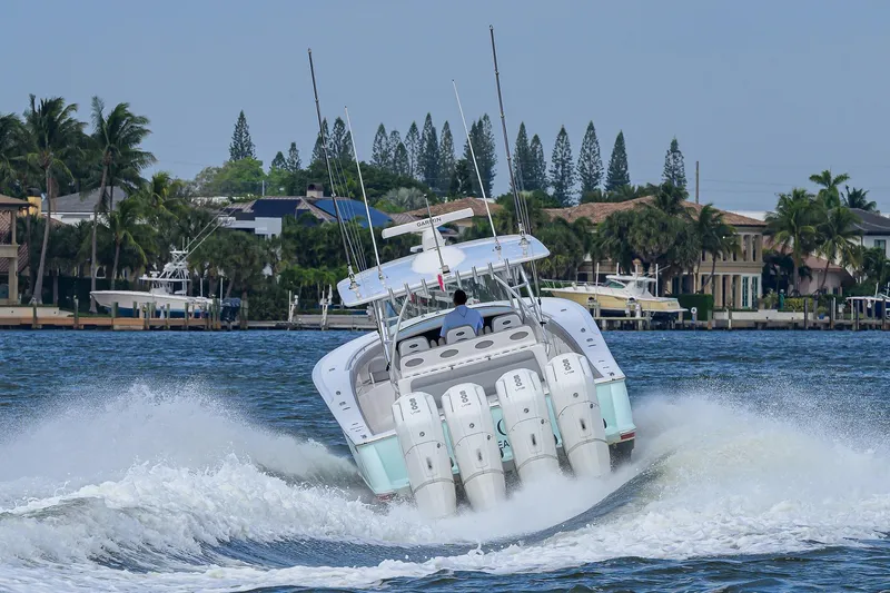 Slide: The Image of 2024 Valhalla Boatworks V-46 cruising on water with powerful engines. - 12