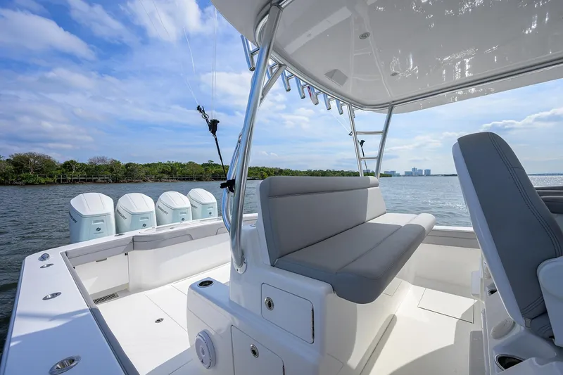 Slide: The Image of 2024 Valhalla Boatworks V-46 with quad engines, sleek seating, and ocean view. - 28
