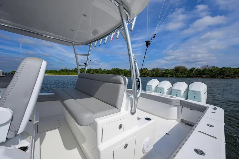 Slide: The Image of 2024 Valhalla Boatworks V-46 with sleek seating and powerful outboard engines. - 29