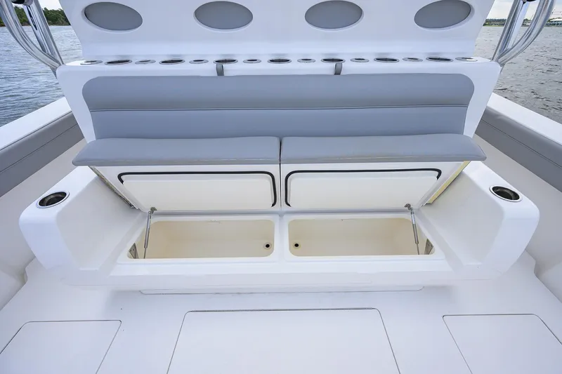 Slide: The Image of 2024 Valhalla Boatworks V-46 seating with storage compartments open on deck. - 35