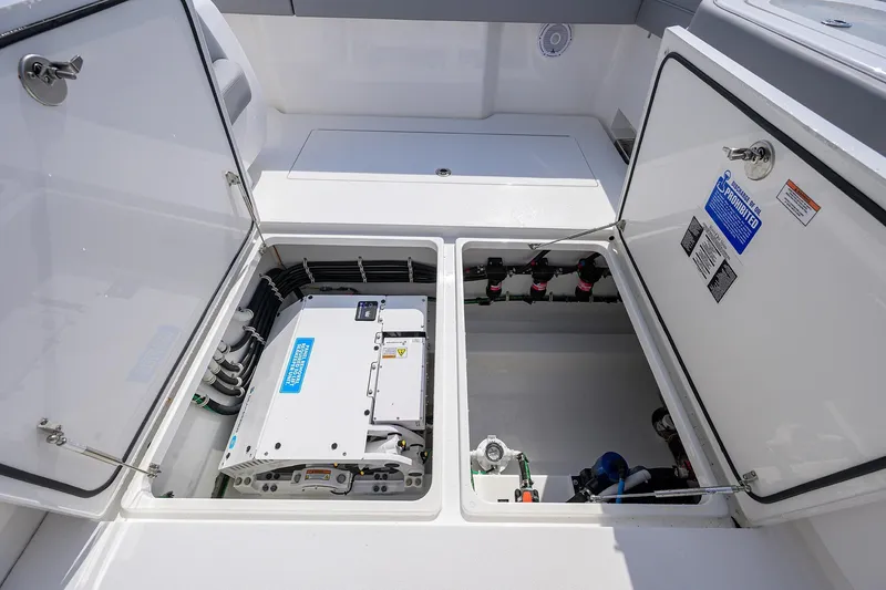 Slide: The Image of 2024 Valhalla Boatworks V-46 engine compartment with open hatches and visible equipment. - 37