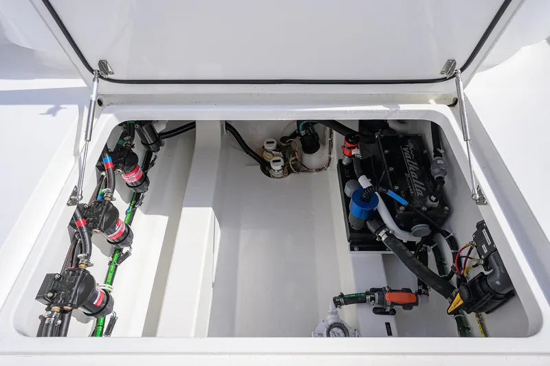 Slide: The Image of 2024 Valhalla Boatworks V-46 engine compartment with visible wiring and components. - 39