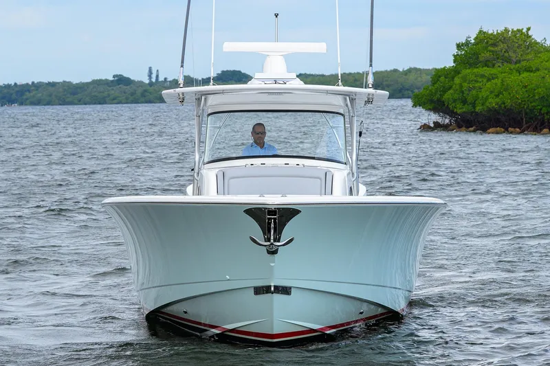 Slide: The Image of 2024 Valhalla Boatworks V-46 cruising on open water, front view. - 7