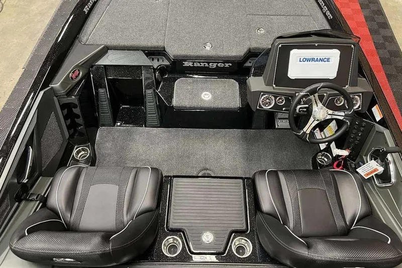 Slide: The Image of 2026 Ranger Z518 Cup-Equipped boat interior with Lowrance system and dual seats. - 4