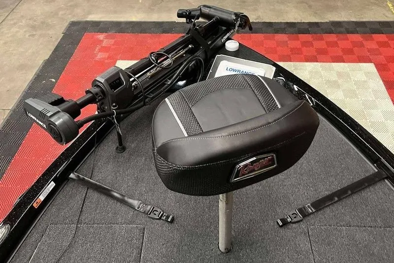 Slide: The Image of 2026 Ranger Z518 Cup-Equipped boat interior with seat and trolling motor. - 8