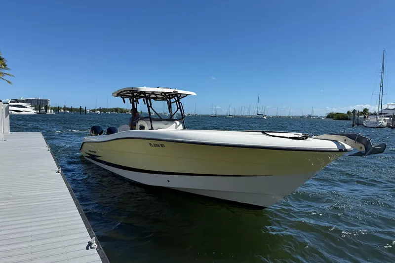 The Image of 2003 Hydra-Sports Vector 3300 CC boat docked on a sunny day. - 0