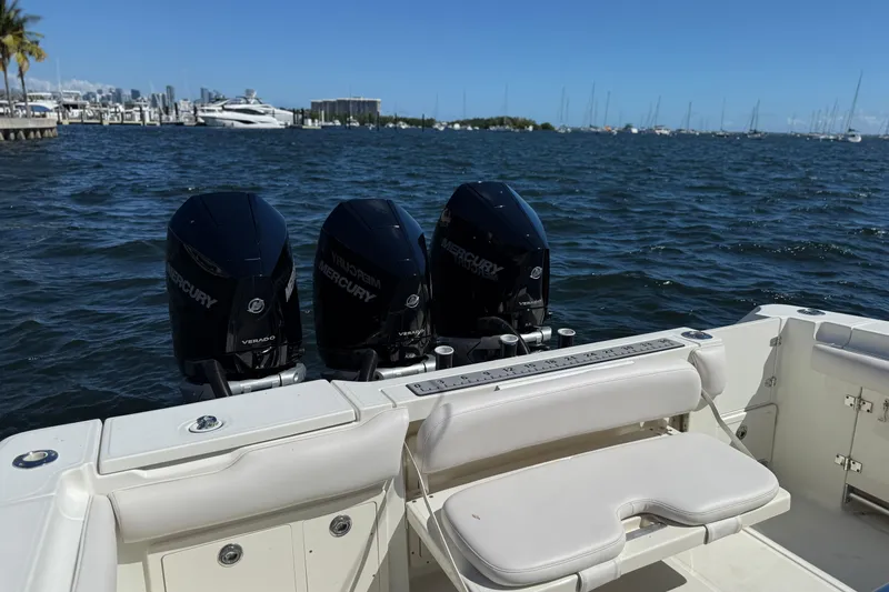 Slide: The Image of 2003 Hydra-Sports Vector 3300 CC with triple Mercury engines on the water. - 12