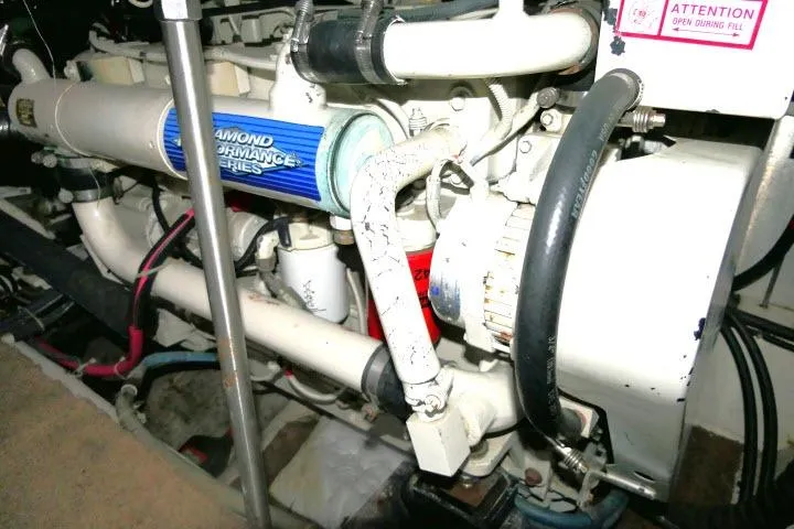 Slide: The Image of Engine compartment of a 2000 Carver 406 Motor Yacht, featuring a Diamond Performance Series engine. - 26