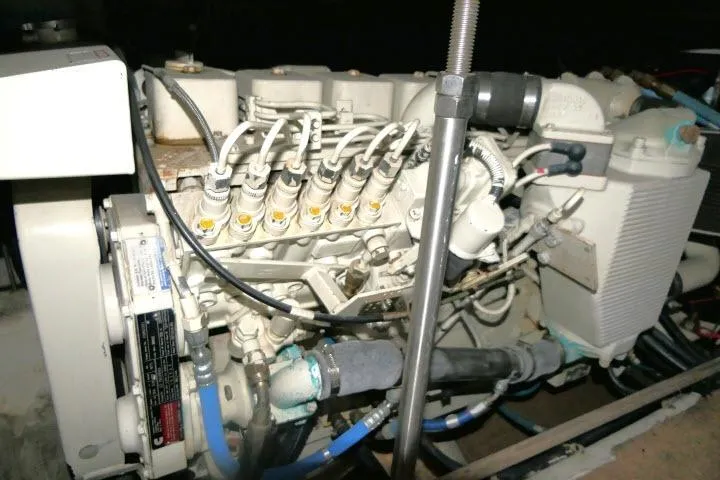Slide: The Image of Engine of 2000 Carver 406 Motor Yacht, showcasing intricate mechanical components. - 29