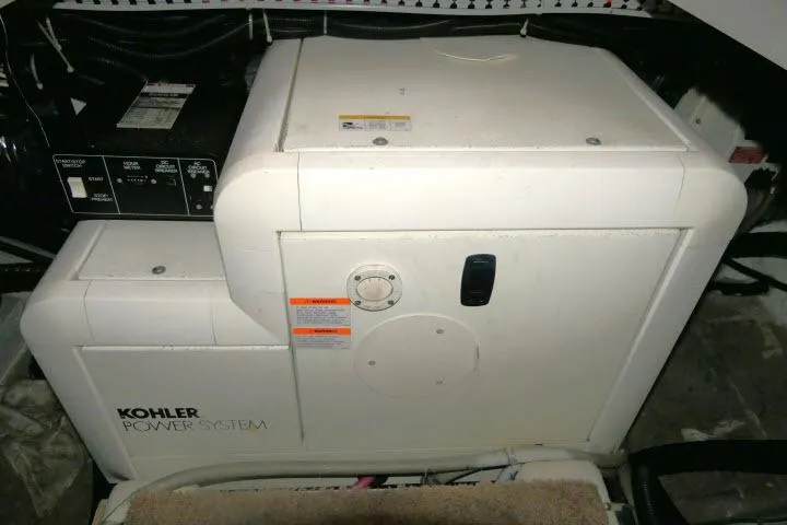 Slide: The Image of Kohler power system in 2000 Carver 406 Motor Yacht engine room. - 32