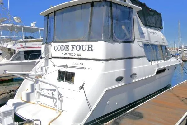 Slide: The Image of 2000 Carver 406 Motor Yacht docked in San Diego marina. - 36