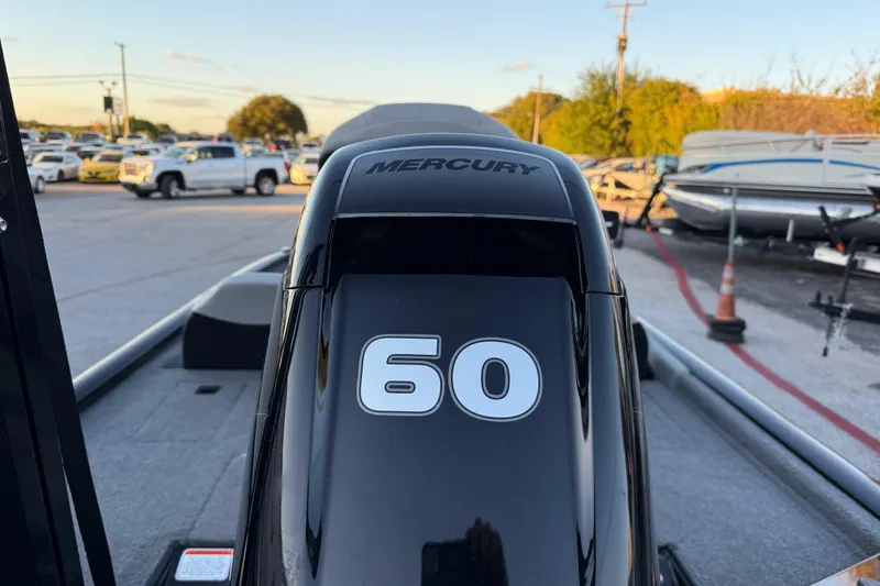 Slide: The Image of 2017 Tracker Pro Team 175 with Mercury 60 outboard engine in parking lot. - 12