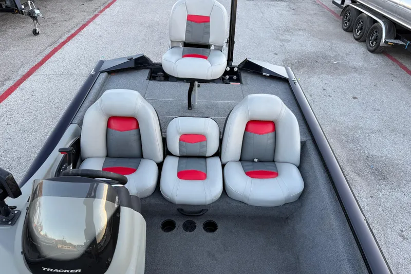 Slide: The Image of 2017 Tracker Pro Team 175 boat interior with gray and red seating arrangement. - 24