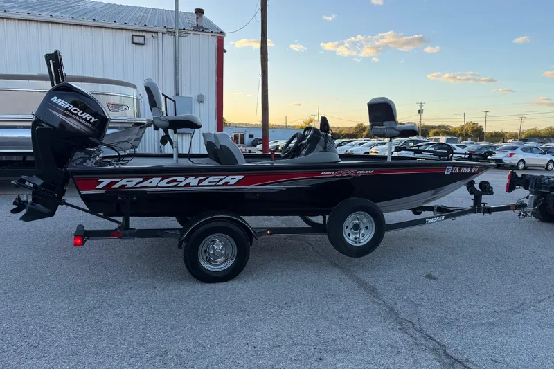 Slide: The Image of 2017 Tracker Pro Team 175 boat with Mercury engine on trailer. - 4