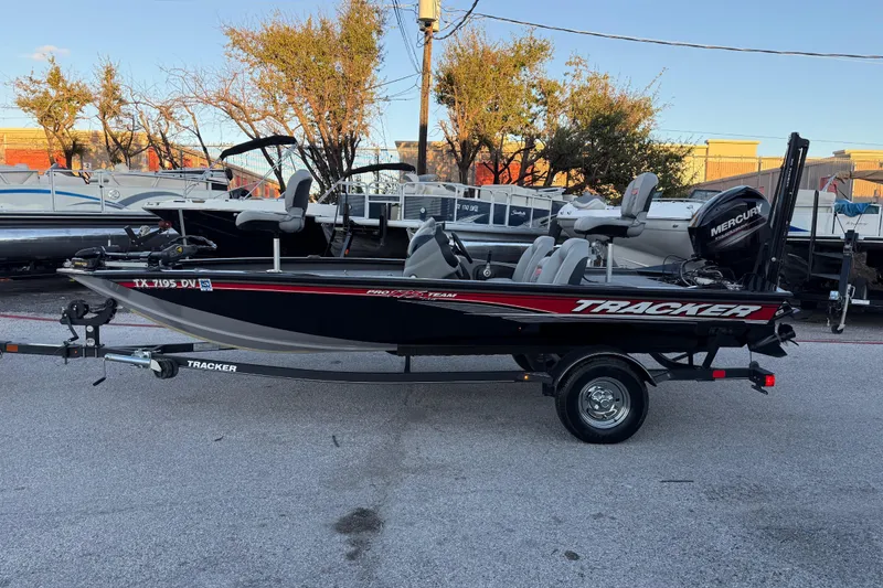 Slide: The Image of 2017 Tracker Pro Team 175 boat on trailer, parked outdoors. - 8