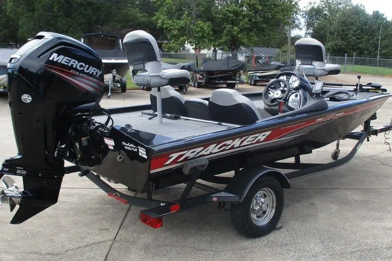 Slide: The Image of 2018 Tracker Pro Team 175 TXW boat with Mercury engine on trailer. - 5