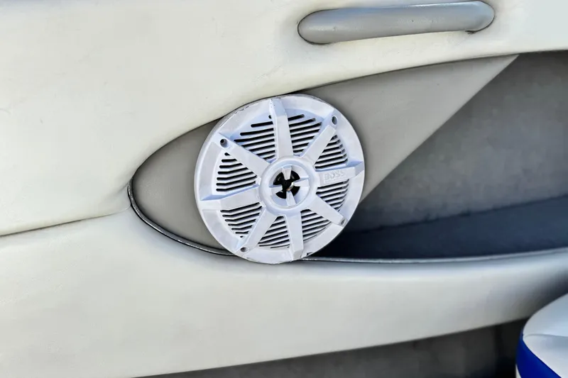 Slide: The Image of Speaker installed on 2006 Bayliner 215 Bowrider boat interior. - 17