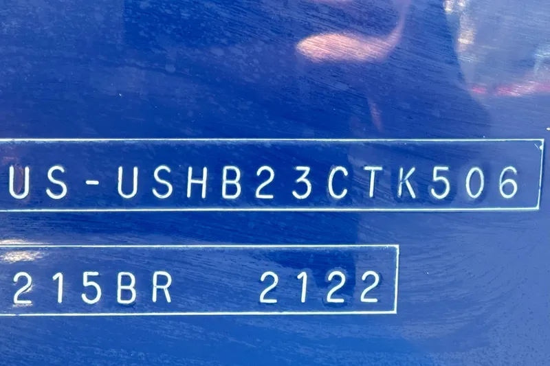 Slide: The Image of Hull identification number on a 2006 Bayliner 215 Bowrider boat. - 27