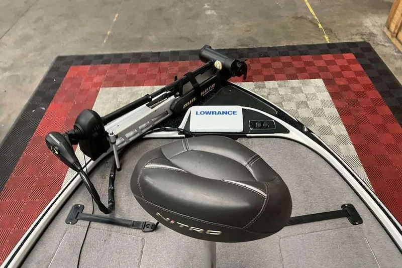 Slide: The Image of 2016 Nitro Z18 boat interior with Lowrance equipment and Minn Kota trolling motor. - 8