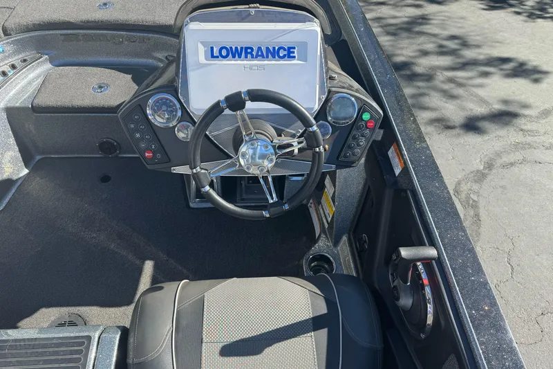 Slide: The Image of 2020 Ranger Z521C boat cockpit with Lowrance HDS display and steering wheel. - 10
