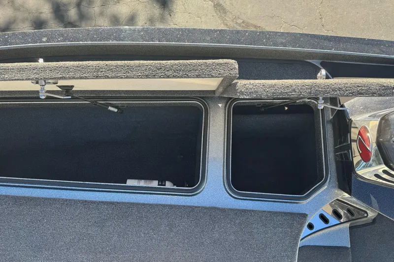 Slide: The Image of 2020 Ranger Z521C Ranger Cup Equipped boat storage compartments, open and empty. - 19
