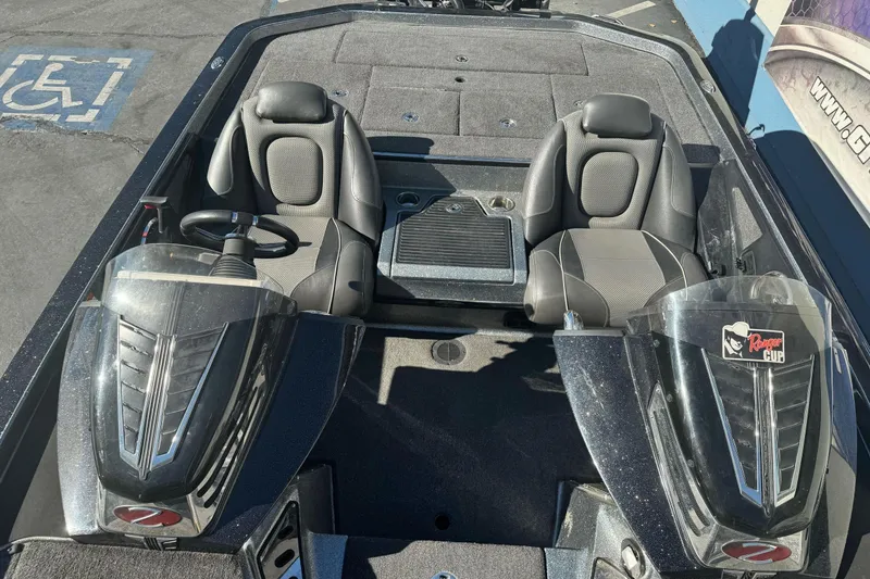 Slide: The Image of 2020 Ranger Z521C Ranger Cup Equipped boat interior with dual seats and steering console. - 8