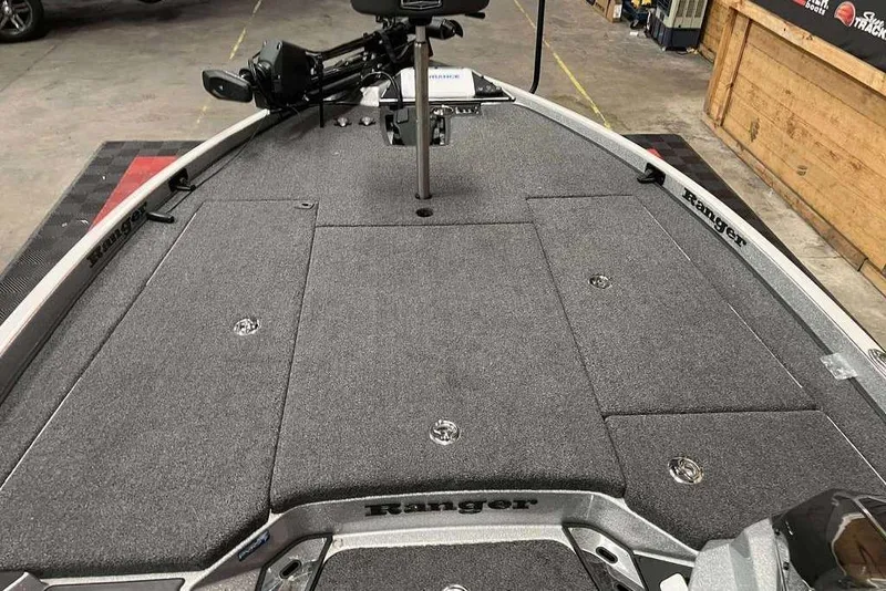 Slide: The Image of 2023 Ranger Z520R Ranger Cup Equipped boat deck with storage compartments. - 6