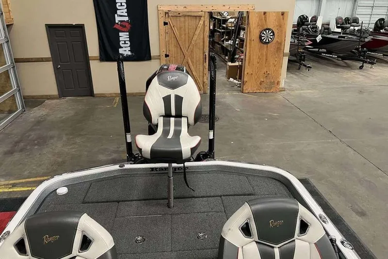Slide: The Image of 2023 Ranger Z520R Ranger Cup Equipped boat interior with premium seating in a showroom. - 8