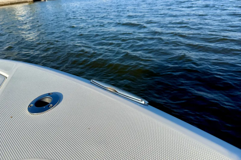 Slide: The Image of 2008 Everglades 350 Center Console boat detail with water background. - 14