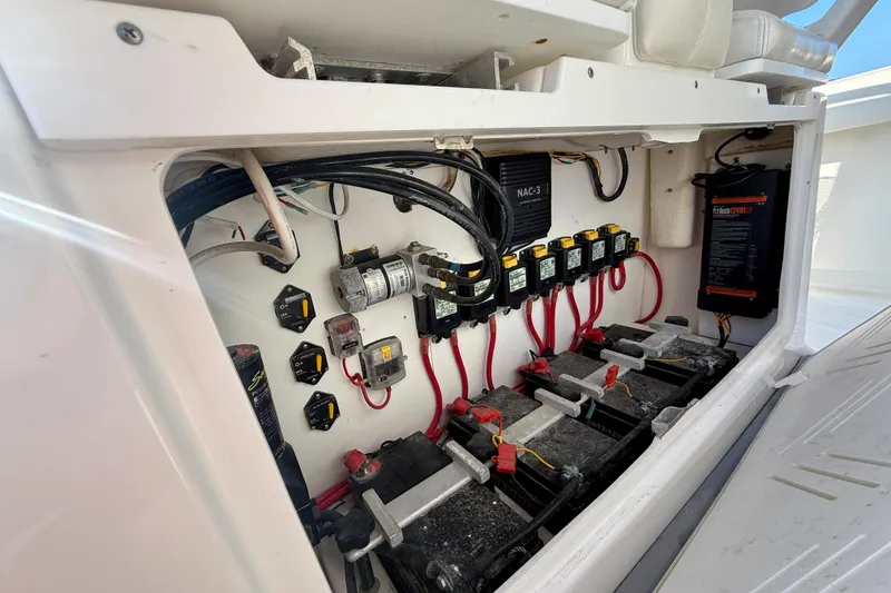 Slide: The Image of Electrical system of a 2008 Everglades 350 Center Console boat, showing batteries and wiring. - 52