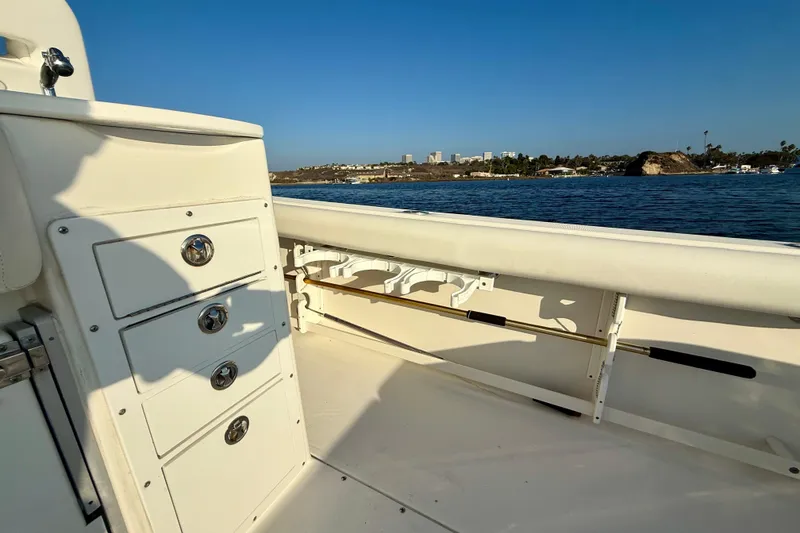 Slide: The Image of 2008 Everglades 350 Center Console boat interior with storage drawers, ocean view. - 55