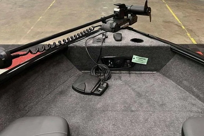 Slide: The Image of 2026 Tracker Pro Guide V-175 Combo boat interior with Minn Kota trolling motor. - 3