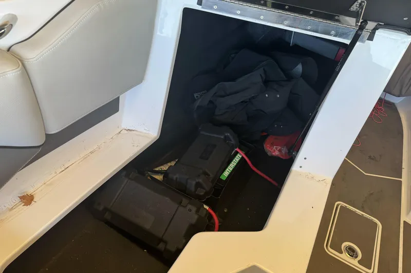 Slide: The Image of Control panel of 2023 Supreme ZS212 boat with labeled switches. - 18