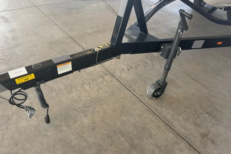 Slide: The Image of Trailer with dual wheels for 2023 Supreme ZS212 boat, featuring sleek design and red accents. - 5