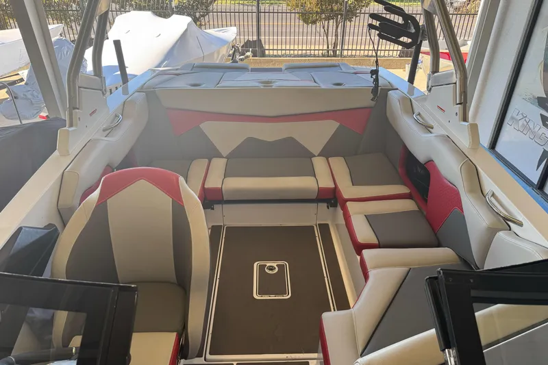 Slide: The Image of 2023 Supreme ZS212 boat rear view with red and white design. - 8