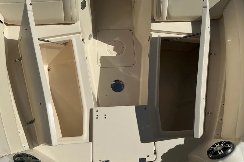 Slide: The Image of 2020 Grady-White Freedom 285 boat interior with open storage compartments. - 15