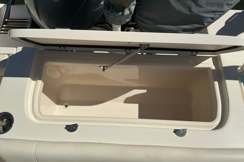Slide: The Image of Open storage compartment on 2020 Grady-White Freedom 285 boat. - 28