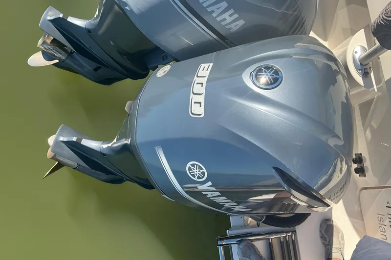 Slide: The Image of Twin Yamaha outboard engines on a 2020 Grady-White Freedom 285 boat. - 29