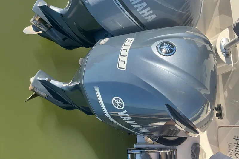 Slide: The Image of Twin Yamaha 300 outboard engines on a 2020 Grady-White Freedom 285 boat. - 30