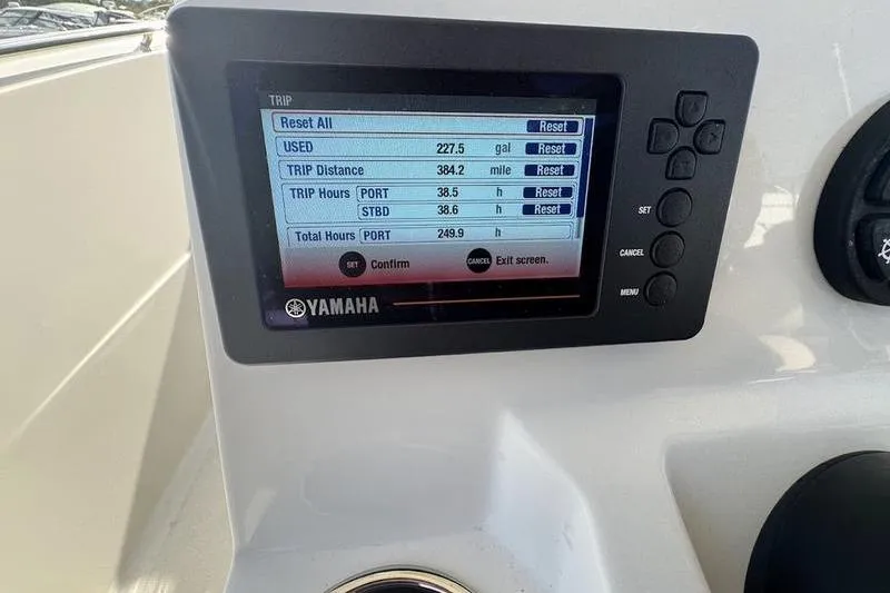 Slide: The Image of Yamaha display on 2021 Sailfish 290 CC showing trip data and fuel usage. - 13