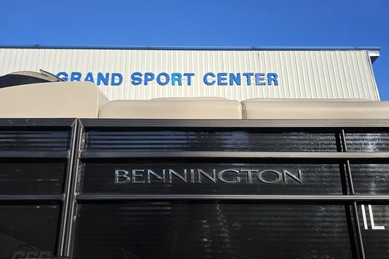 Slide: The Image of 2015 Bennington 2550 QBR at Grand Sport Center, blue sky background. - 14