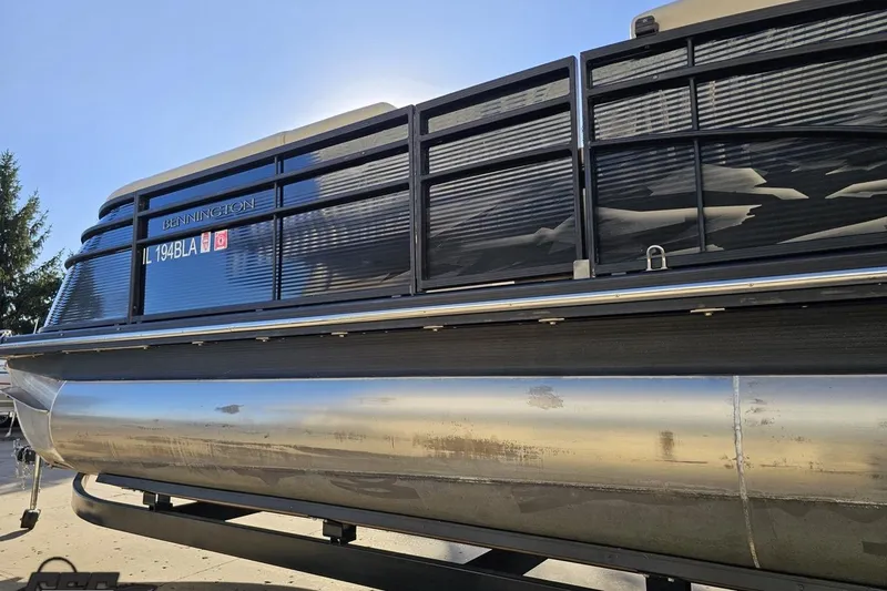 Slide: The Image of 2015 Bennington 2550 QBR pontoon boat, side view with registration details. - 28