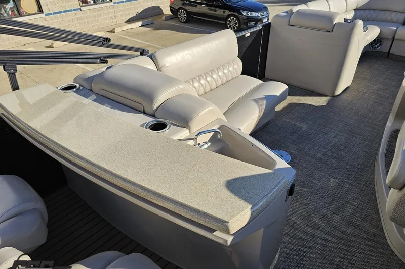 Slide: The Image of 2015 Bennington 2550 QBR pontoon boat interior with luxurious seating and modern design. - 44