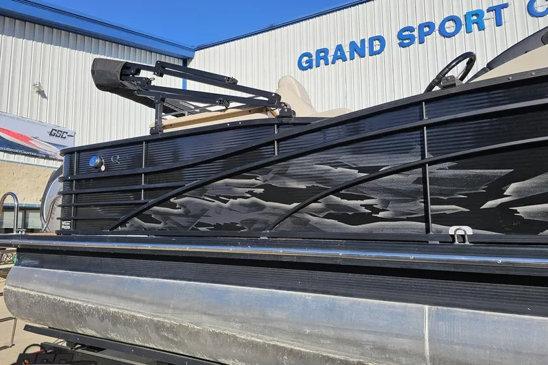 Slide: The Image of 2015 Bennington 2550 QBR pontoon boat at Grand Sport Center, featuring sleek black design. - 6